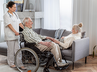 Caregiver providing mobility assistance to elderly person